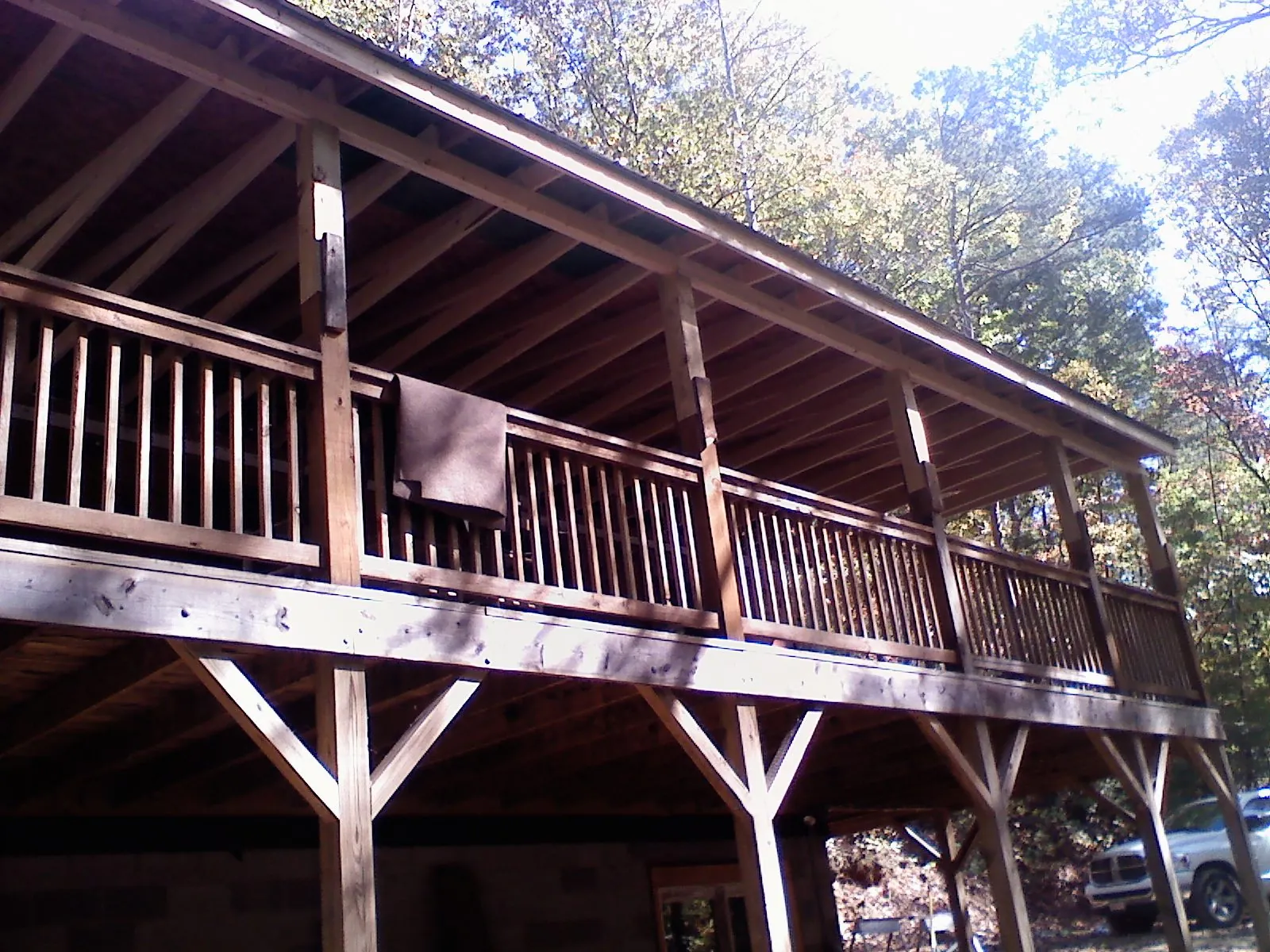 Timber framing under a new elevated porch and deck — Roof Leak Repair in Street by Roofing Brothers